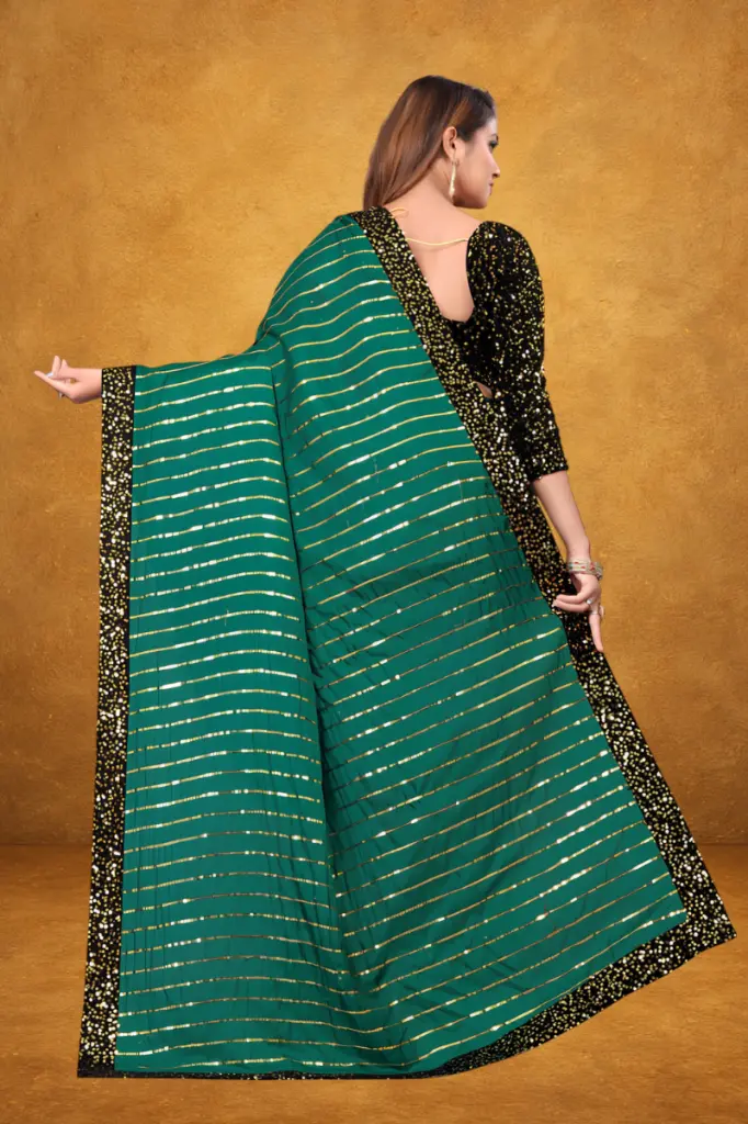 attiris green sequin saree (1).webp